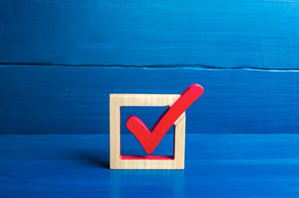 Red checkmark with a blue background